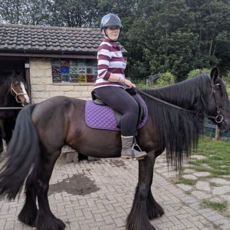 Kirsty riding a horse