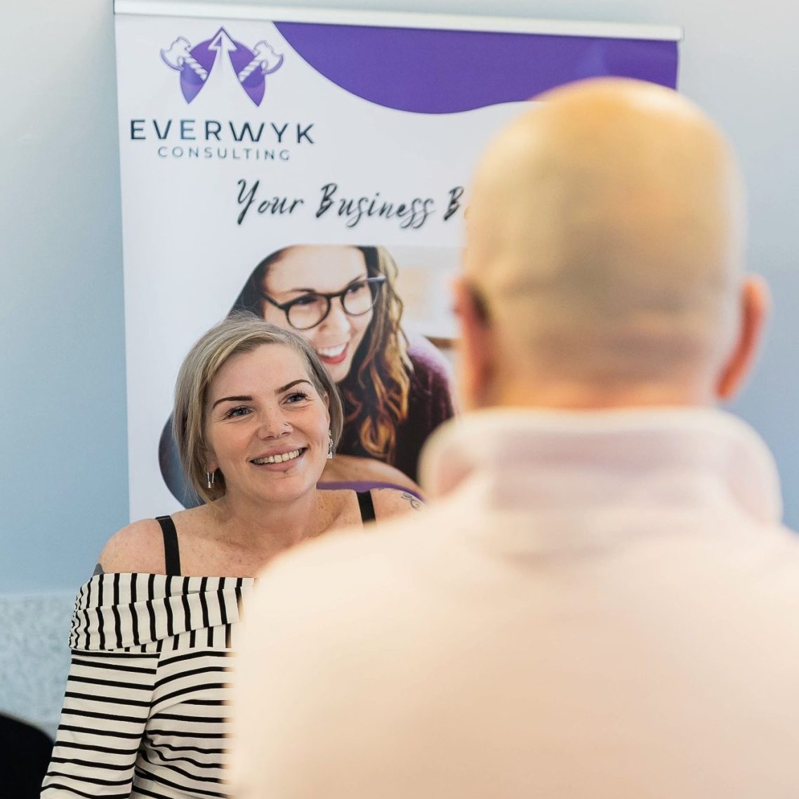 Kirsty Speaking with customers at an expo